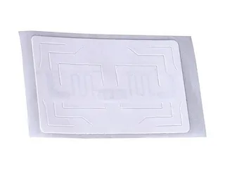 UHF RFID label on its liner, with the inlay antenna visible through the white face